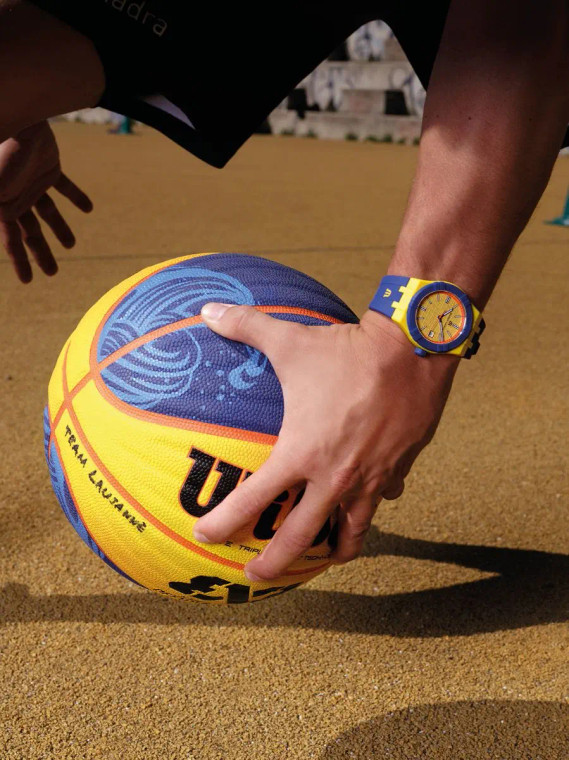Maurice Lacroix is pleased to unveil the special edition watch that upholds the benefits of the recently launched AIKON #tide collection, combining them with the exciting world of 3x3, the global basketball format beloved by millions. Sharing the same qualities as other members of the AIKON family, these latest watches prove a game changer both on and off the court.

Irrespective of which special edition watch you choose to wear, you will be contributing to cleaner oceans as well as looking cool on and off the court. Quite simply, the Maurice Lacroix AIKON #tide FIBA 3x3 is a game changer!




KEY ELEMENTS OF THE WATCH
The AIKON #tide shares the same attributes as other members of AIKON family but is formed of #tide ocean-bound upcycled plastic combined with glass fiber. The resultant composite material is twice as hard as standard plastic, five times more resistant, and has a carbon footprint significantly less than the production of virgin PET. The bezel, case, case back, crown, end-piece, and buckle on this new model are all made from this composite material. It takes 17 bottles to make one fabulous watch and its tailor-made packaging is 100% made of #tide ocean material®. It’s a win-win deal.
CASE DIAMETER 40mm yellow color case, with blue bezel
CASE MATERIAL Made from ocean-bound upcycled plastic
WATER RESISTANCE Water resistance to 10 ATM
DIAL Yellow with "3X3" finish and date at 3 o'clock, orange outer ring
STRAP MATERIAL Blue Rubber
EASY STRAP EXCHANGE Yes
BUCKLE Made from ocean-bound upcycled plastic pin buckle
MOVEMENT Quartz
FUNCTIONS Hours, minutes and seconds. Date at 3 o'clock.