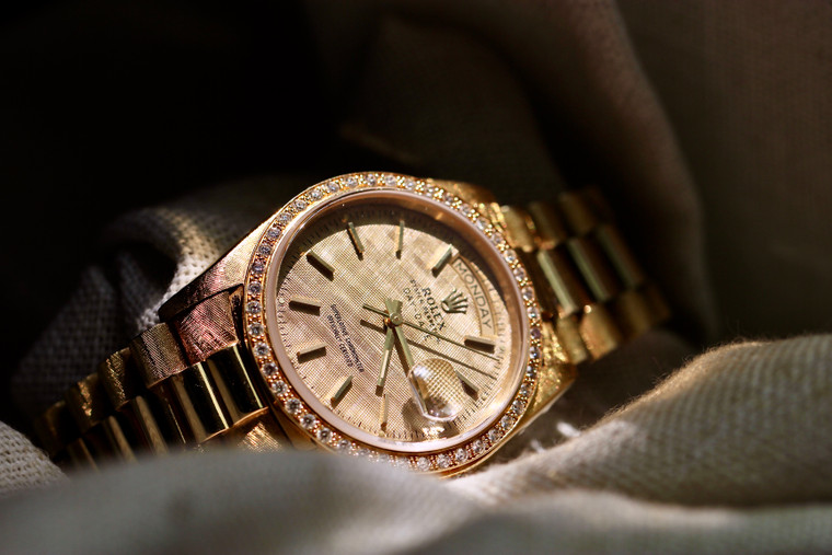 1981 Rolex Day-Date Ref. 18038 Linen Dial and Florentine/Morellis engraved finish "President" bracelet 18K Yellow Gold